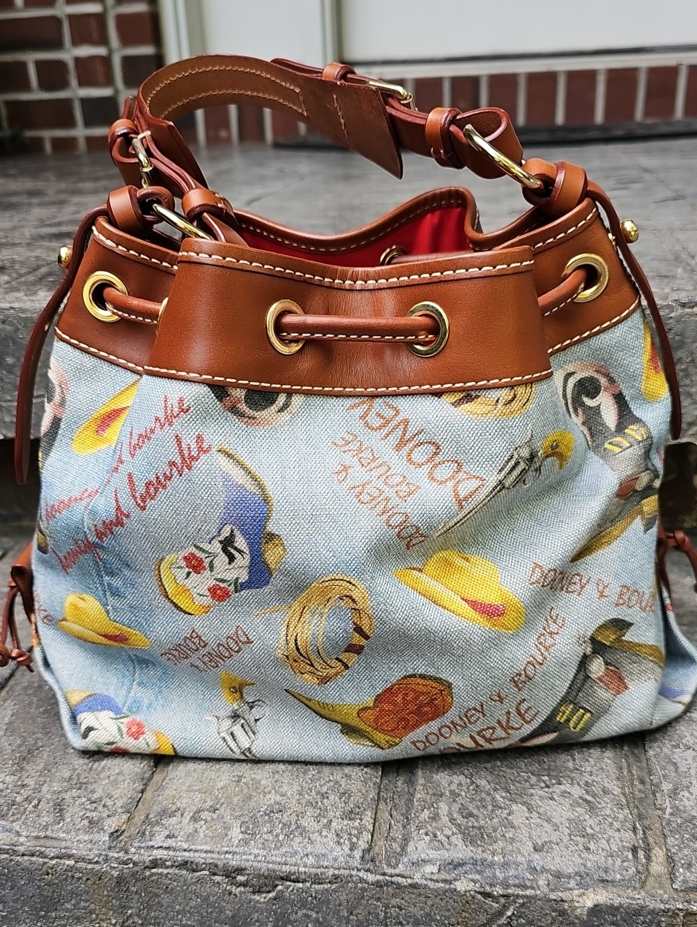 Dooney & Bourke Light Blue Printed Drawstring Satchel with Brown Trim - Picture 2 of 3